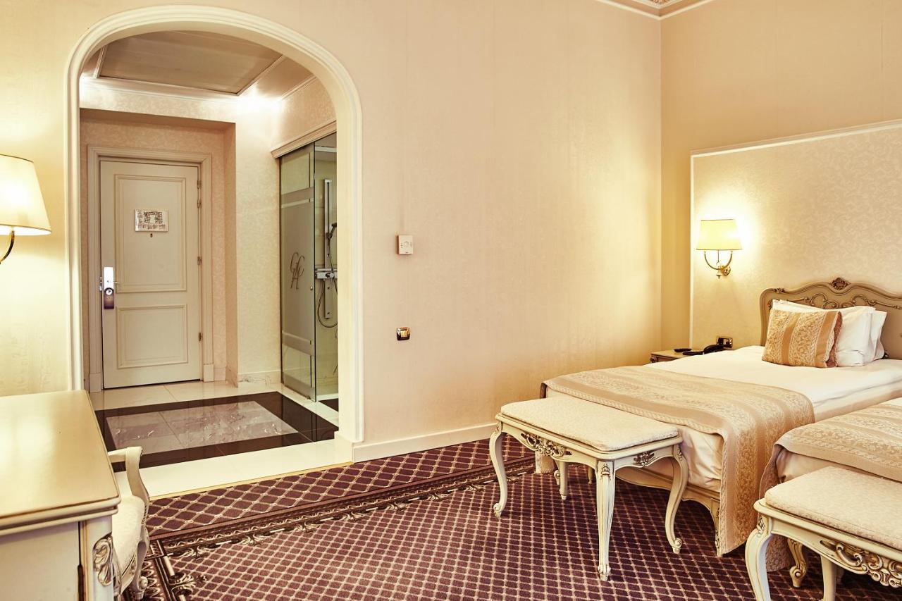 大陆酒店 布加勒斯特 外观 照片 A room at the hotel